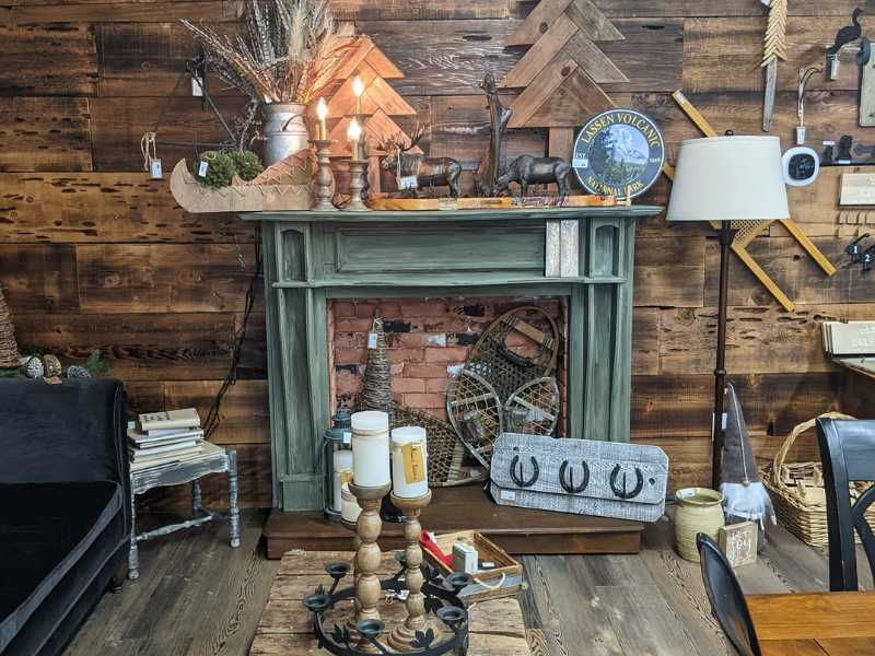 Display at Rusty Chandelier, coffe table and fireplace mantle