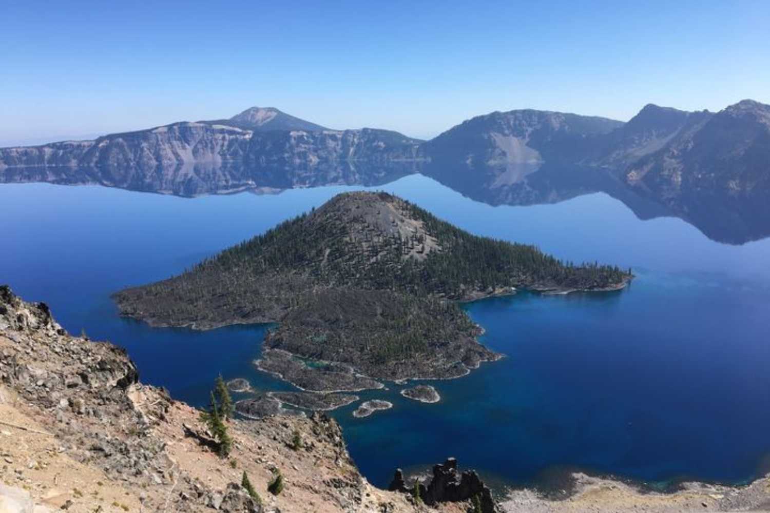 Crater Lake National Park view of Wizard Island in Crater Lake.One of the 12 National and State Parks on a California Road Trip