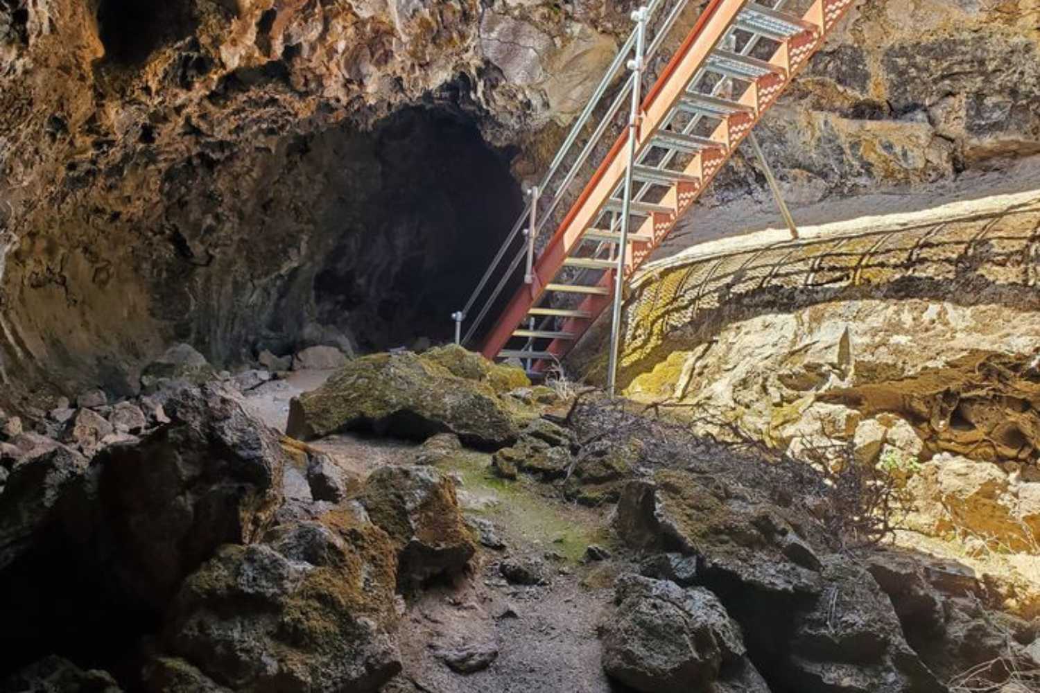 Lava Beds National Monument Sunshine Cave. Staircase leading into the cave.One of the 12 National and State Parks on California Road Trip