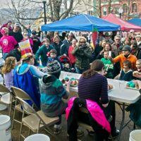 groups at tables during groundhog fever event