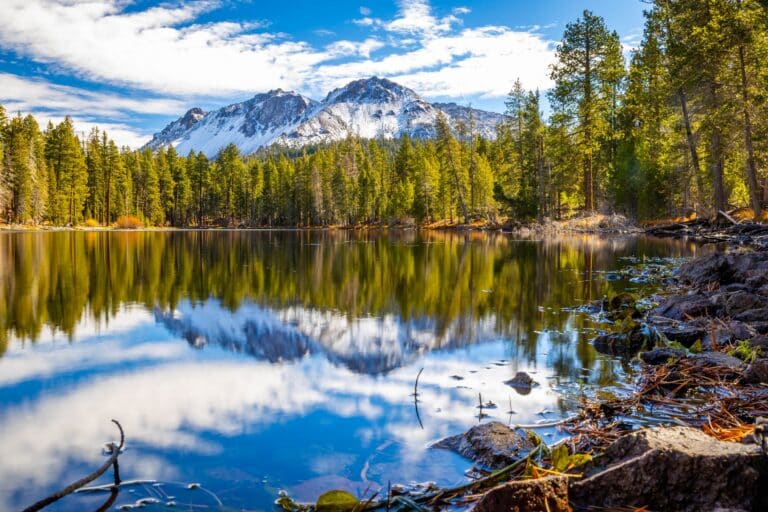 Lassen Peak with Manzanita Lake. Lassen Peak Trail is one of our favorite hikes on Lassen Volcanic National Park Trails.