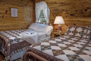 Cozy room with two beds at our European-style lodging near Lassen Park 